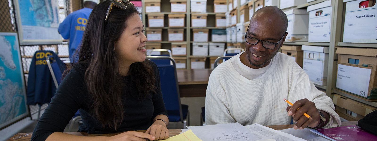 Faculty and student in study session at San Quentin