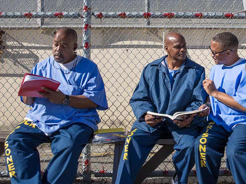 Mount Tamalpais College students studying in the yard at San Quentin State Prison